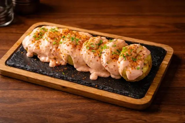 Papas bravas — Entrantes, Típico Asador Argentino